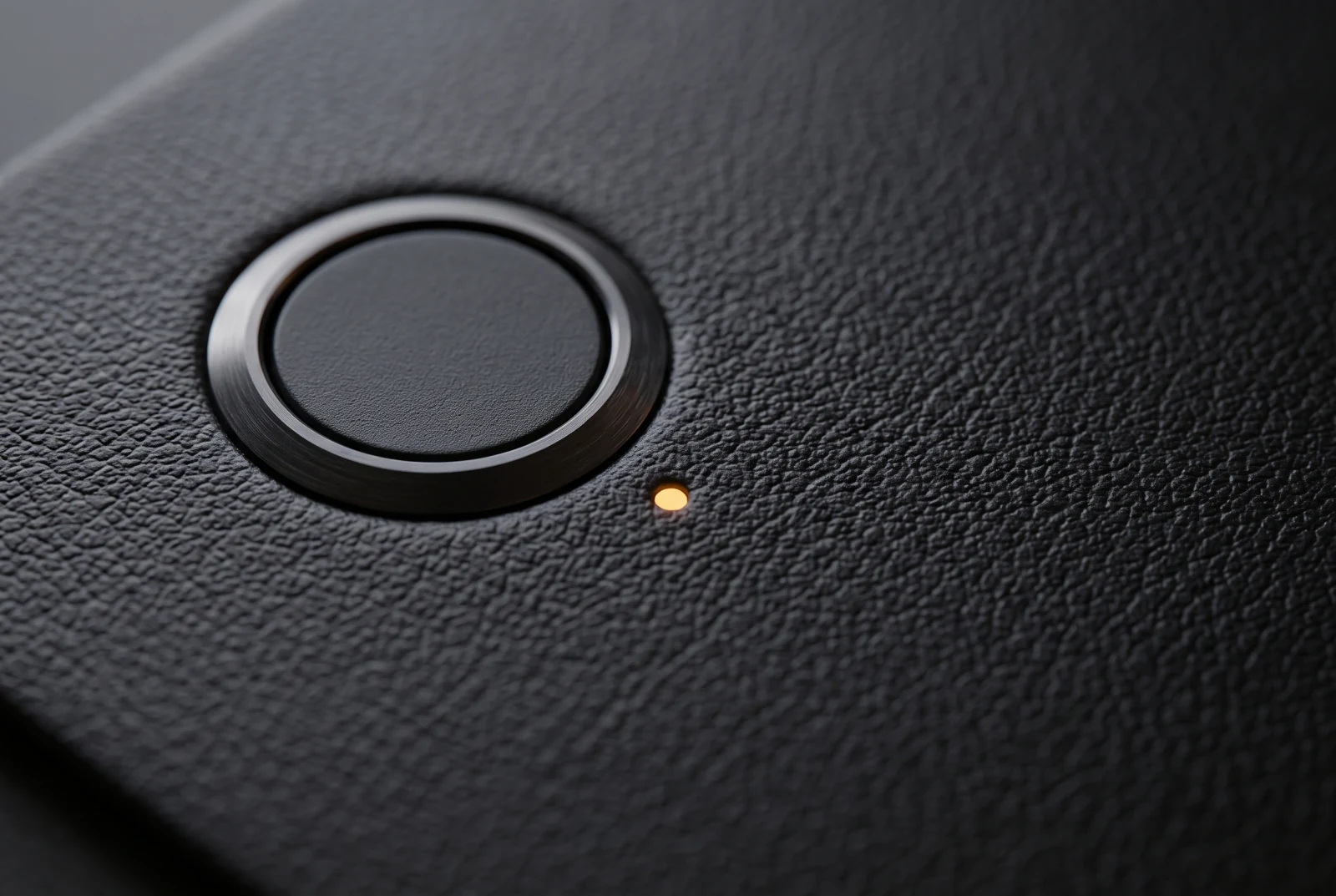 The button and status light, close up